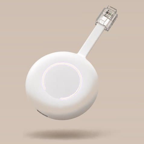 The smart connector, a round white puck with a softly lit ring and a short cable ending in a network plug.
